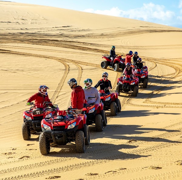 Timlalin renting Quads and sandboarding