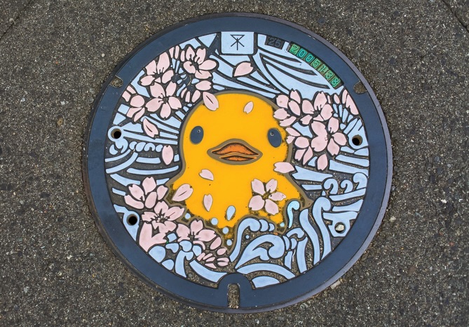 Osaka Manhole Covers: Castle And Rubber Duck Art