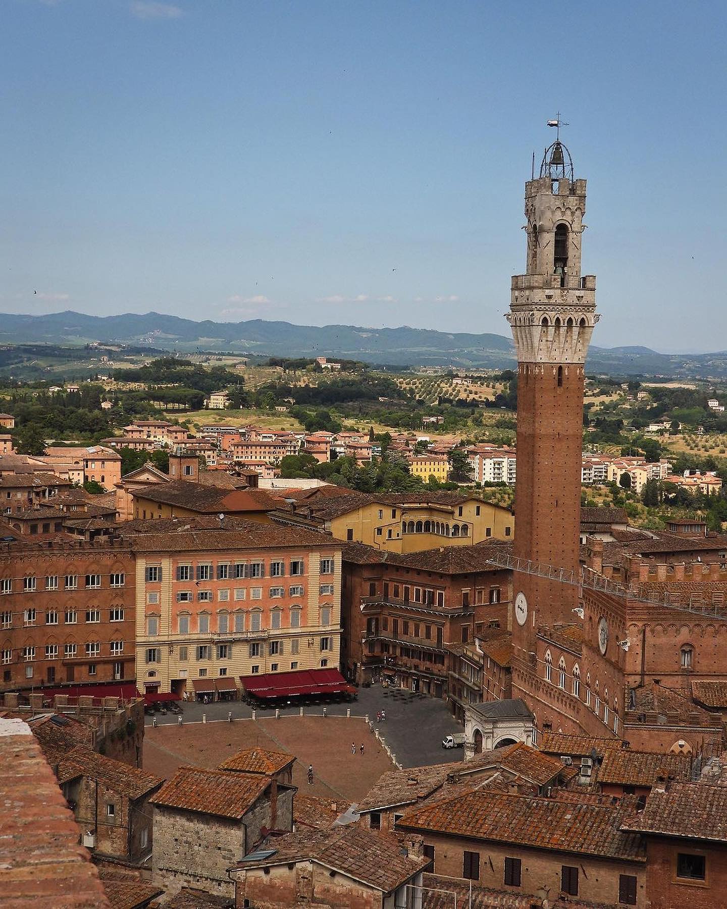Siena's Historic Heart: Piazza, Palace, and Tower