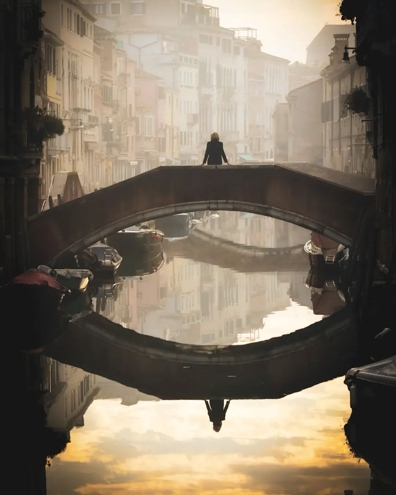 Misty Venice Canal Scene With Person On Bridge