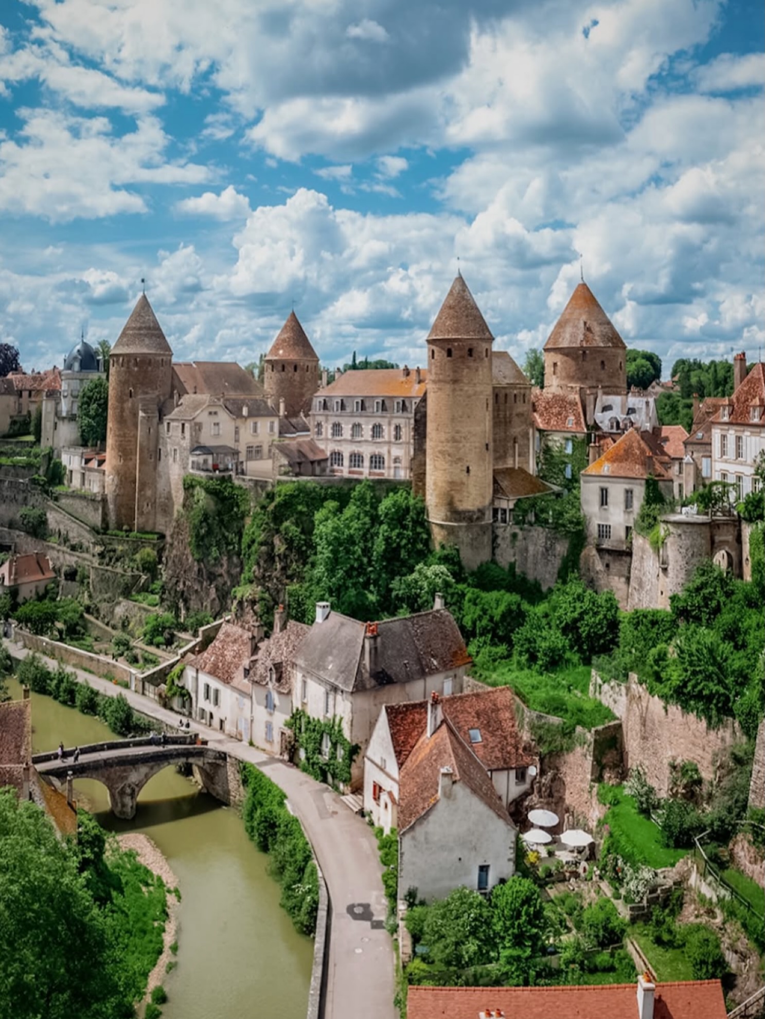 Medieval French Town with Notable Castle Ruins