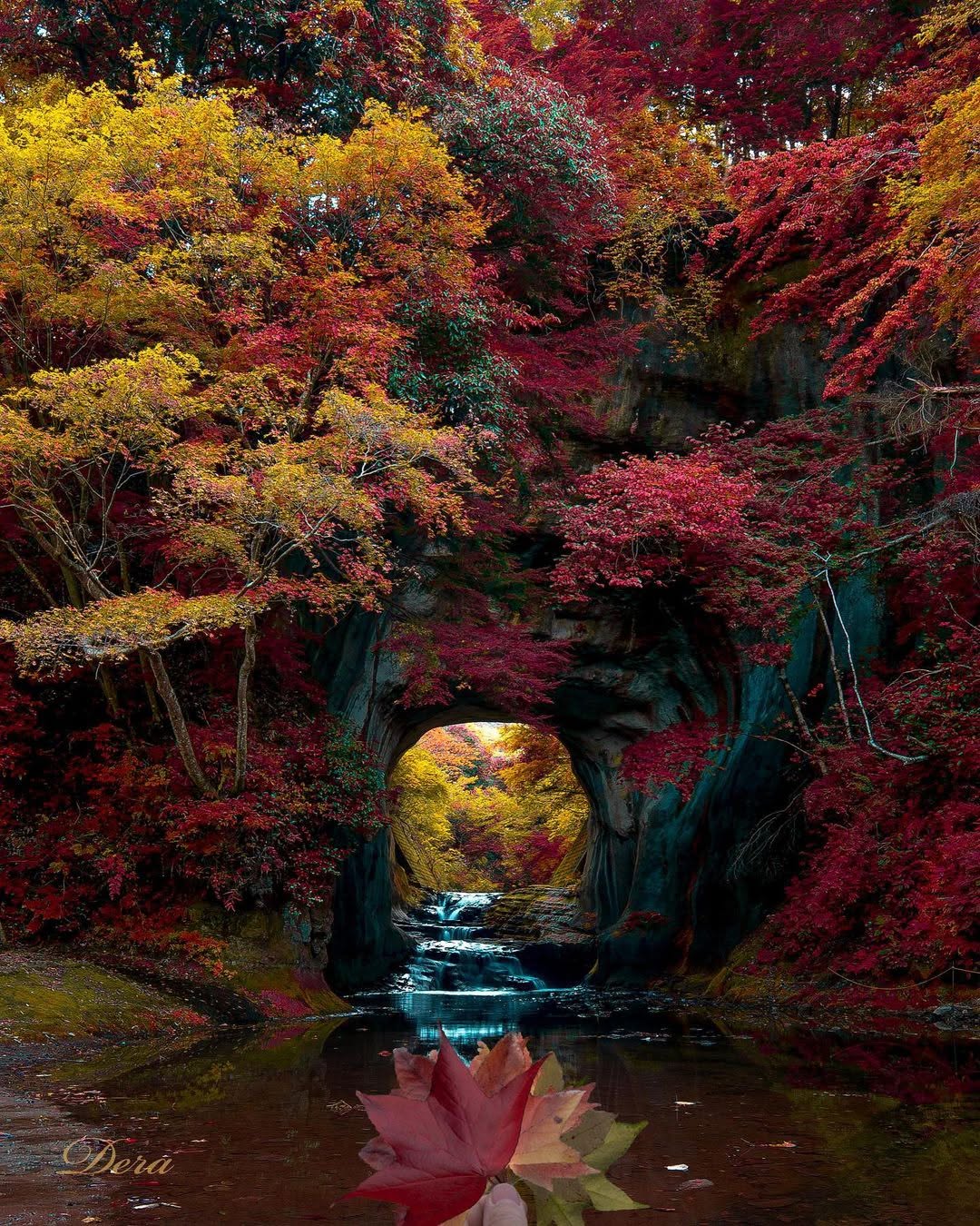 Waterfall and Cave Reflections In Autumn