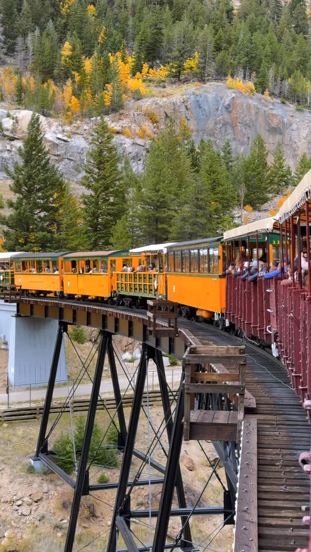 Historic Train Ride Through Colorful Mountain Scenery