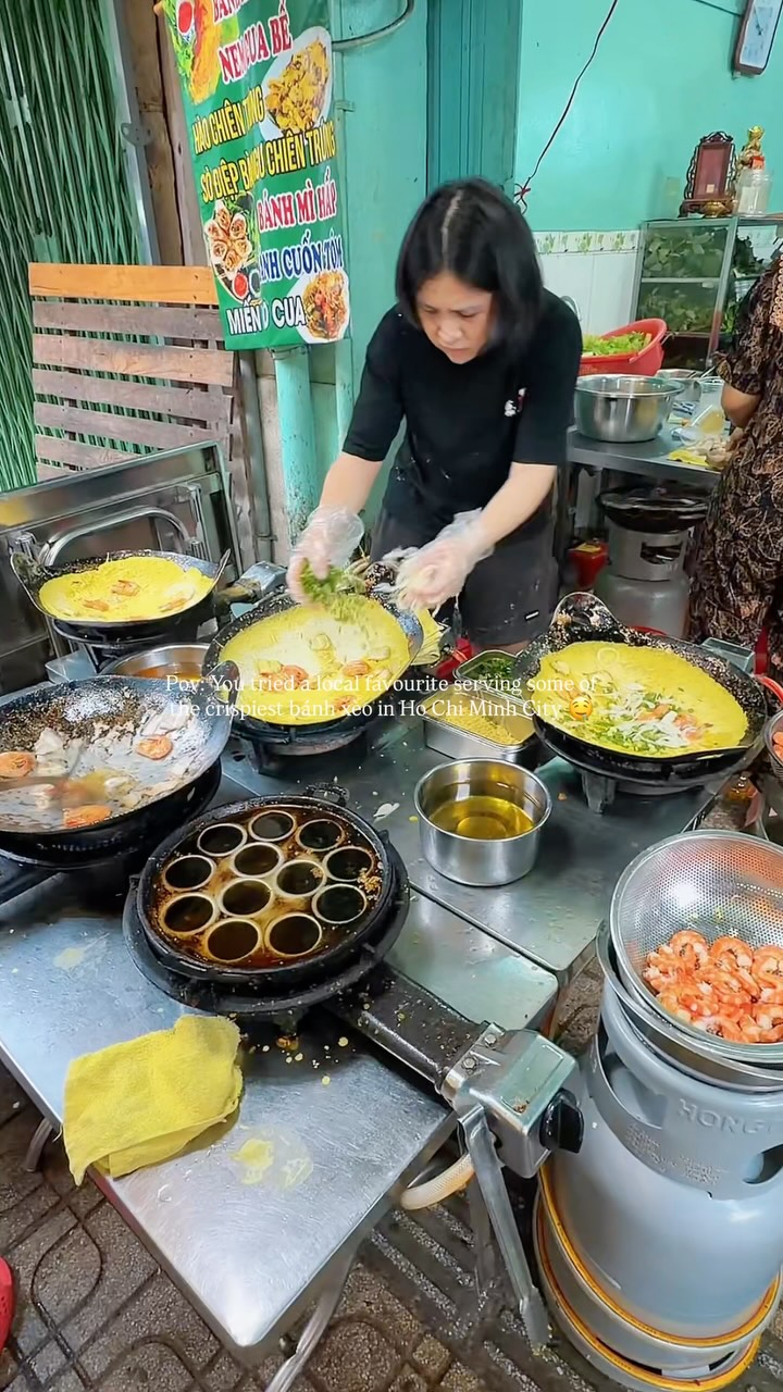 Vietnamese Street Food Vendor Serves Banh Xeo