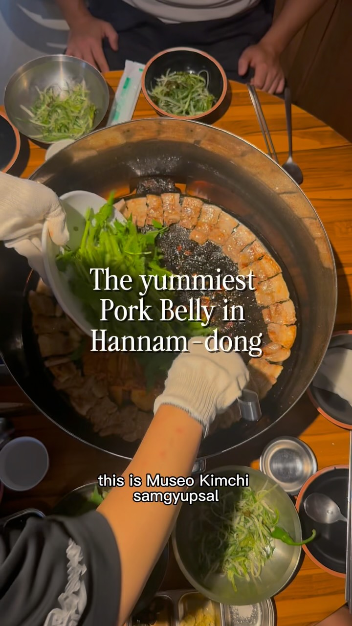 Pork Belly Dining at a Korean Restaurant