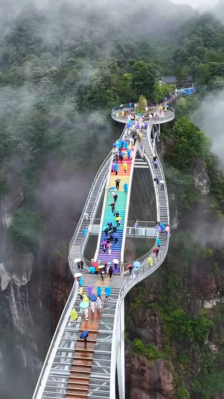 Glass Bridges Over Dramatic Mountain Scenery
