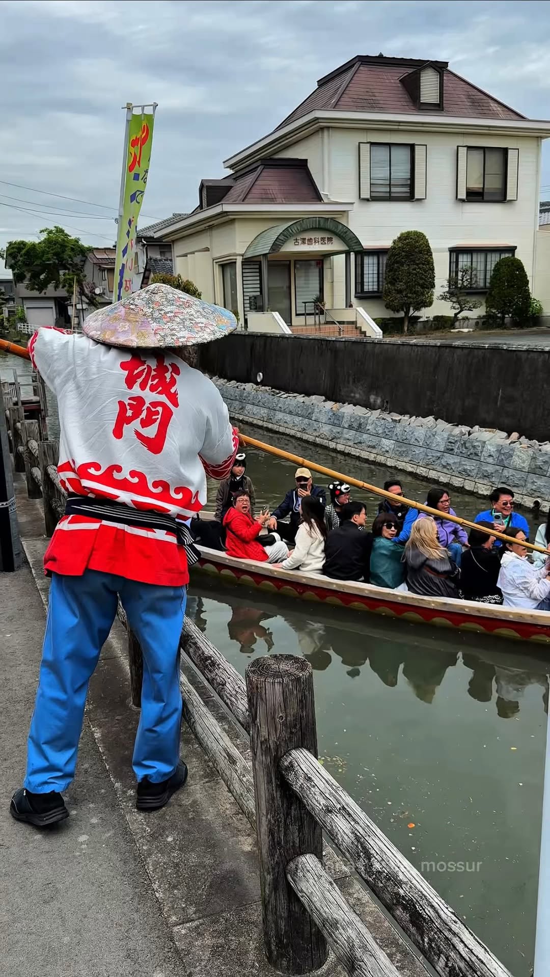 Bridge Jump Boatman's Skillful Canal Ride