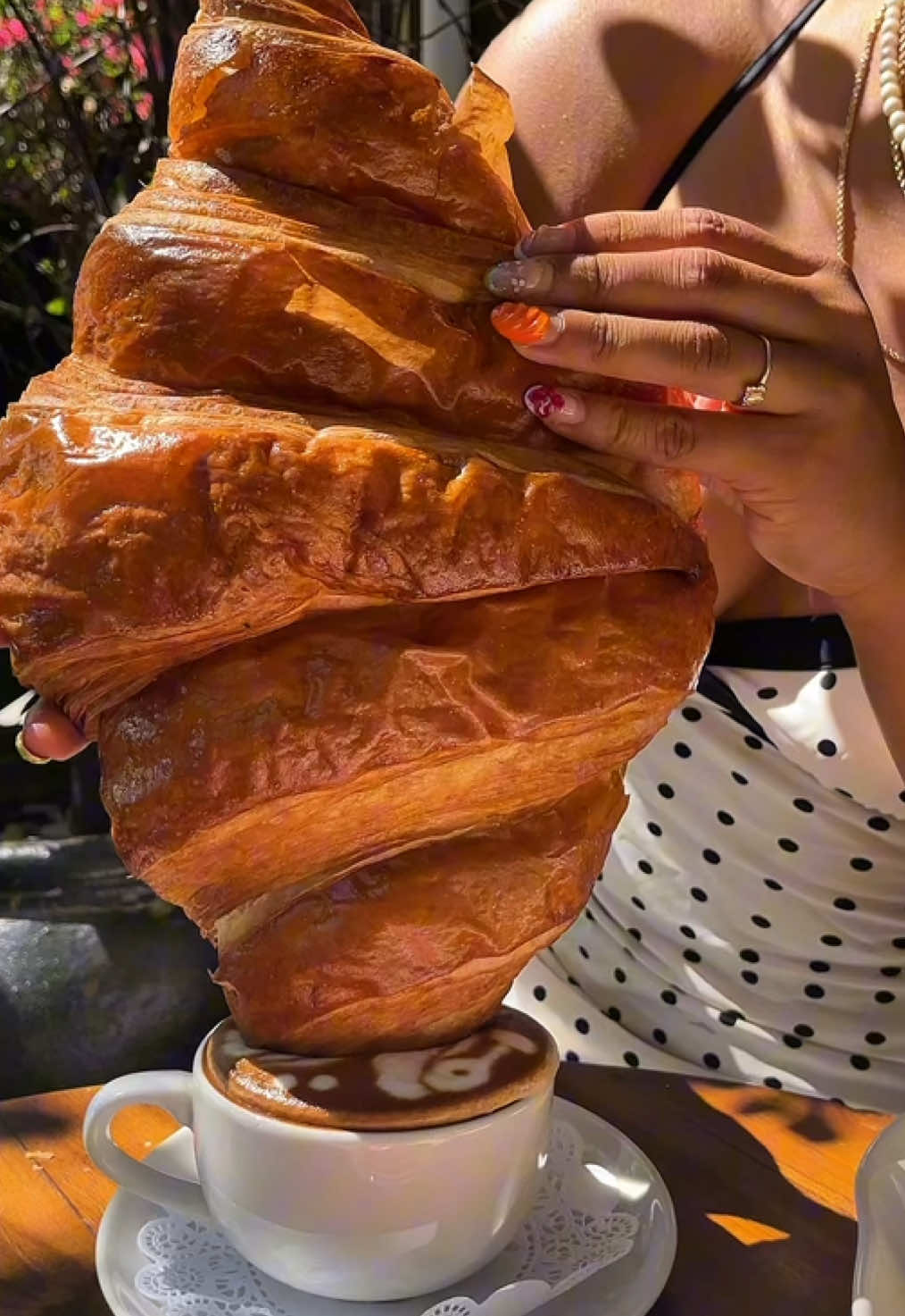 Lova Cafe Features Giant Croissant and Diverse Menu