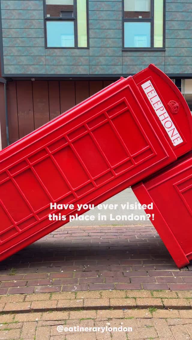 Red Telephone Boxes Form Domino Art Installation