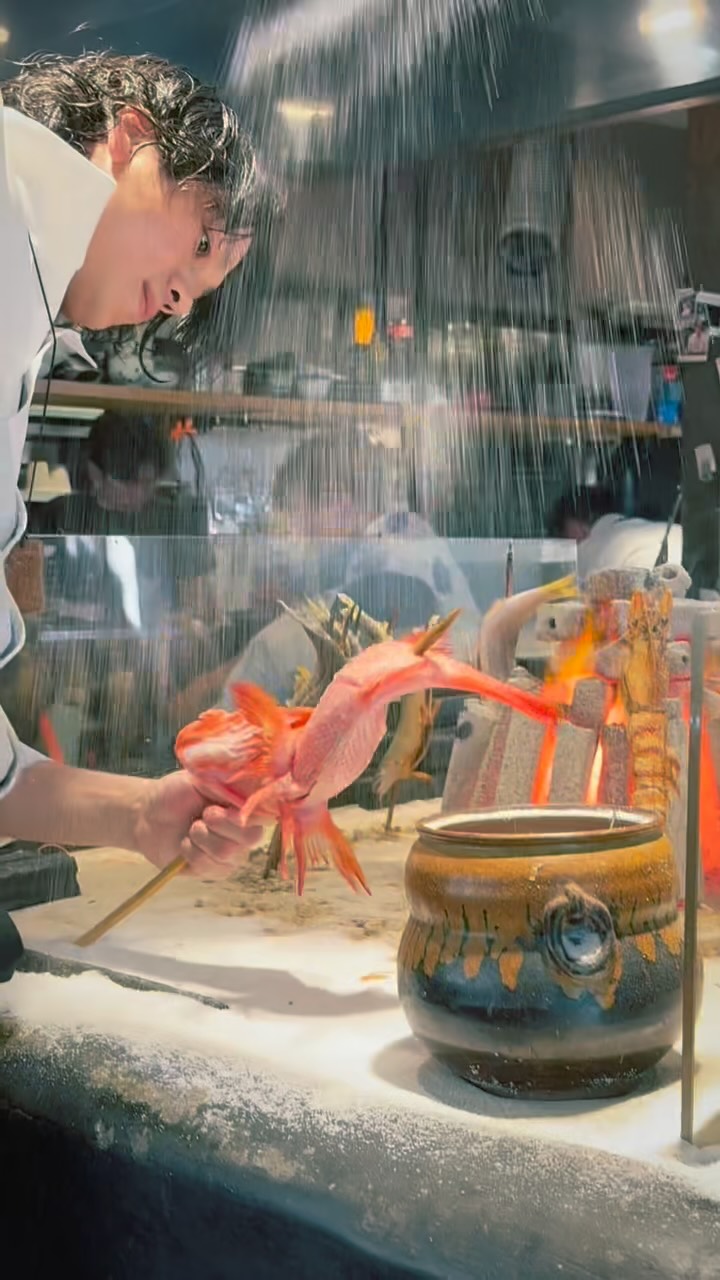 Robatayaki Restaurant in Fukuoka With Golden Statue