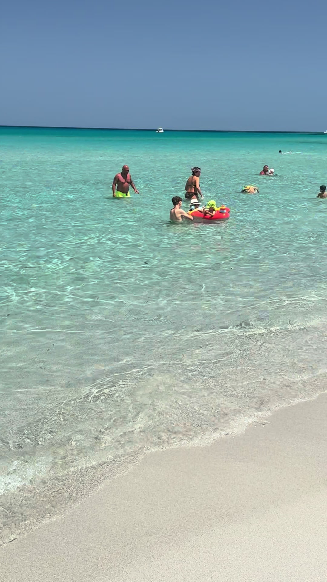 Turquoise Waters At Capo Comino Beach
