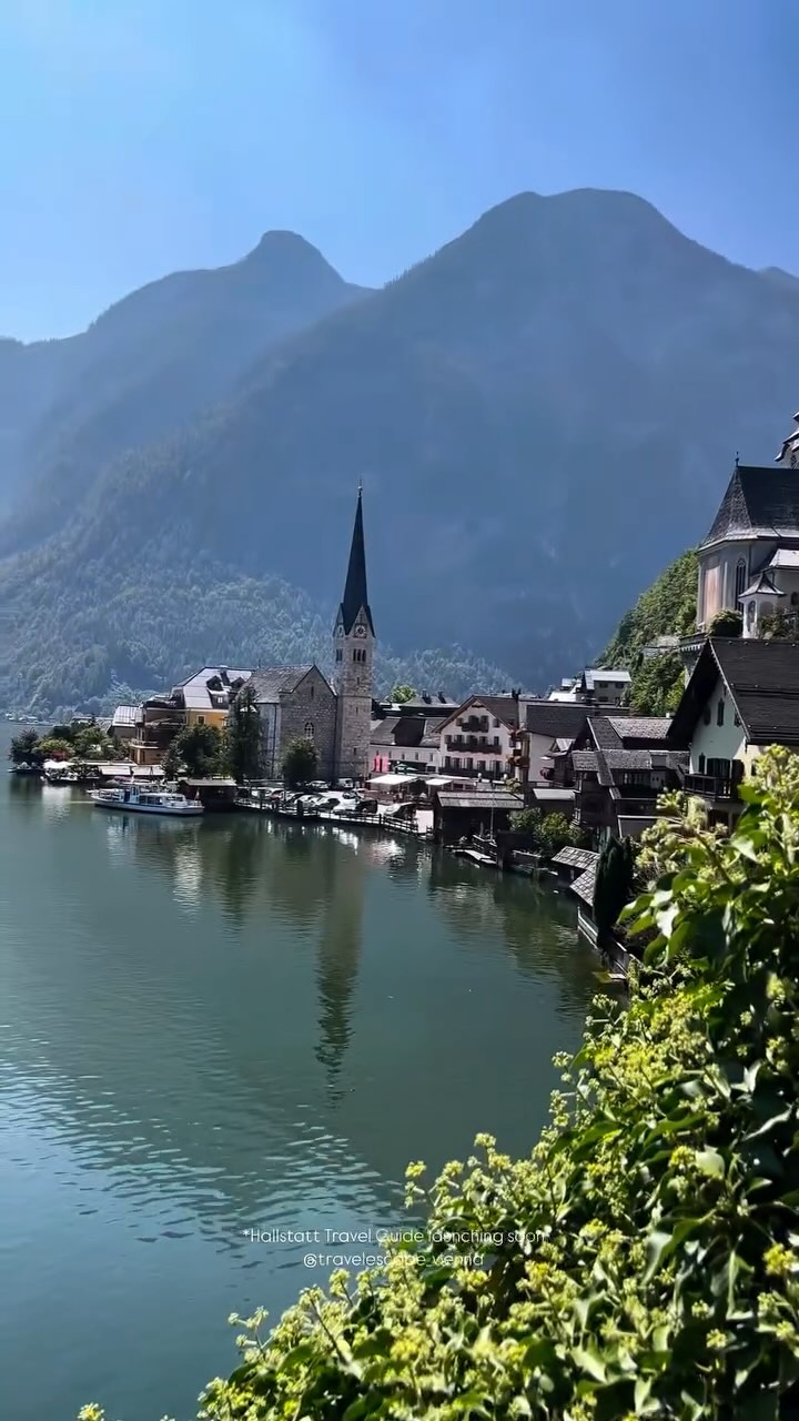 Hallstatt's Charm: Lakeside Houses and Historic Cathedral