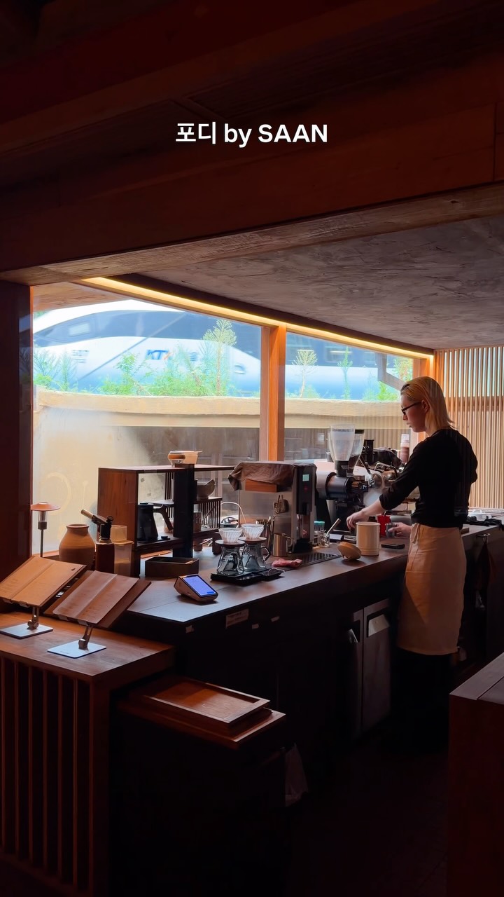Cafe With Mountain Lodge Ambiance and Passing Trains