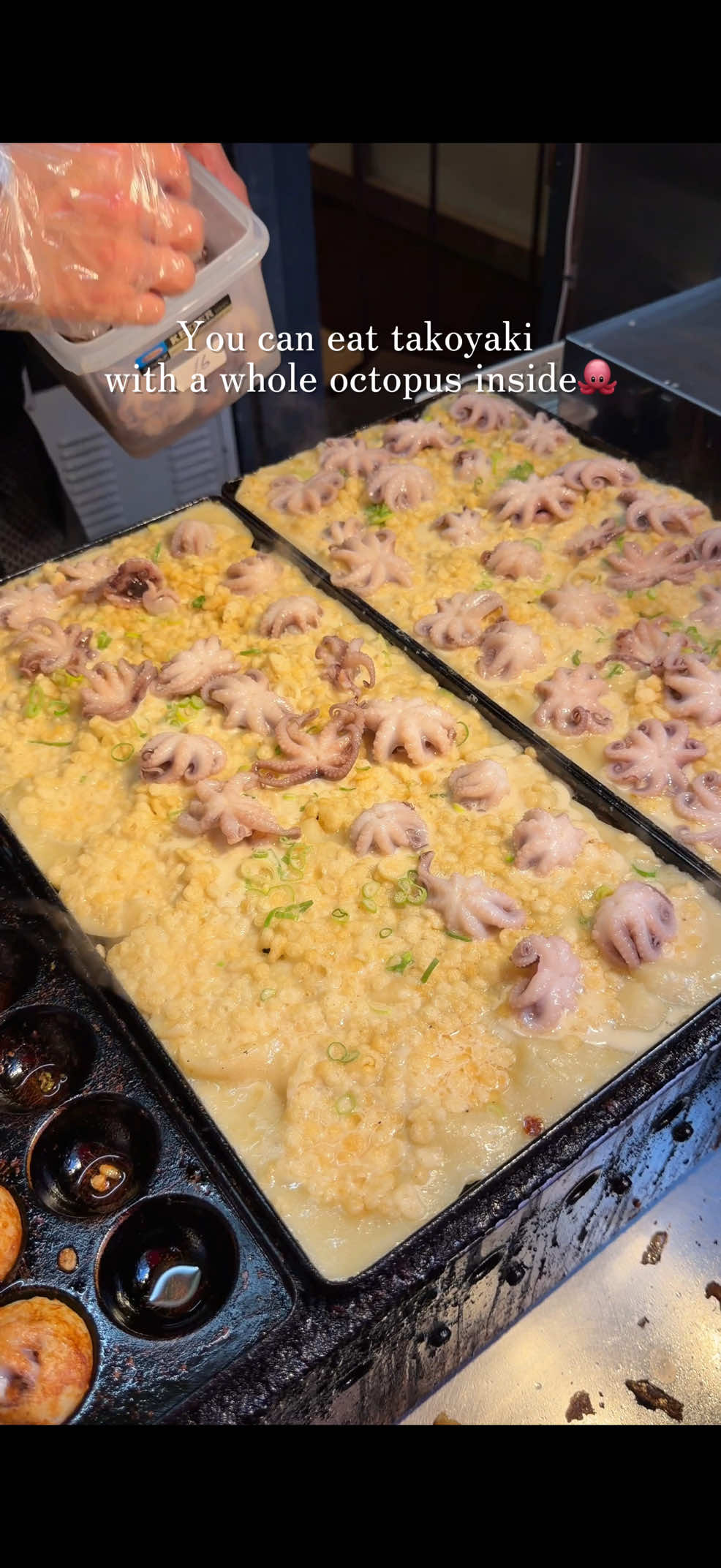 Odoridako Dotonbori's Unique Whole Octopus Takoyaki