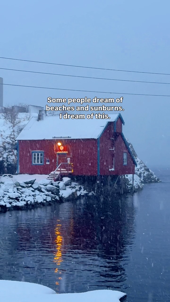 Arctic Fjords With Red Cabins