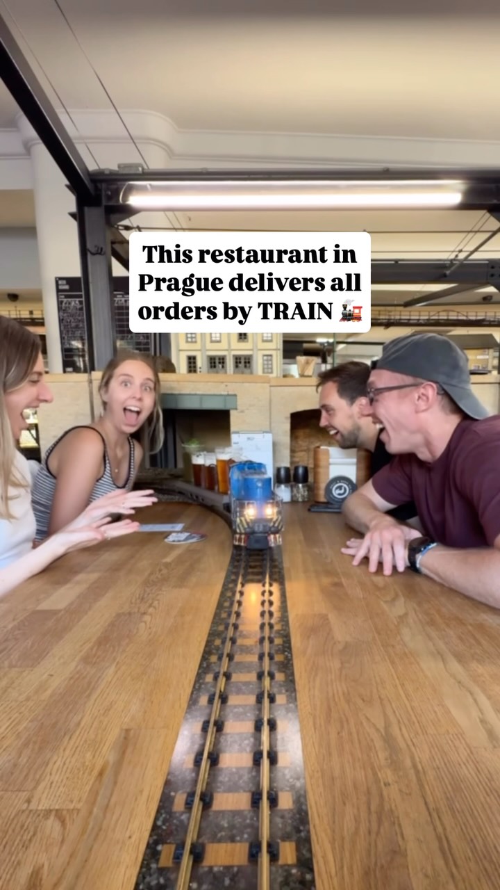 Prague Restaurant Features Toy Train Food Delivery