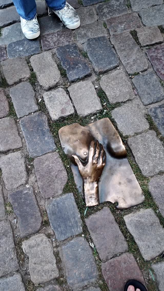 Amsterdam's Red Light District Bronze Breast Tradition