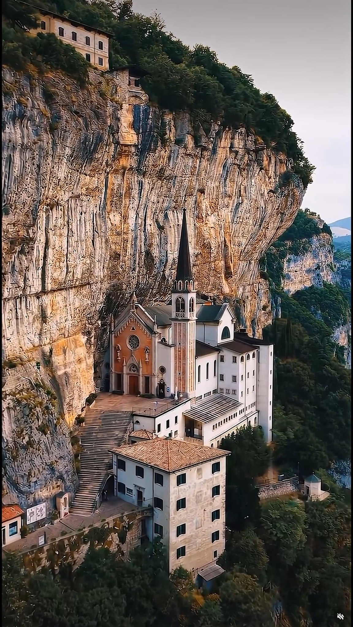 Cliffside Sanctuary and Dramatic Mountain Path