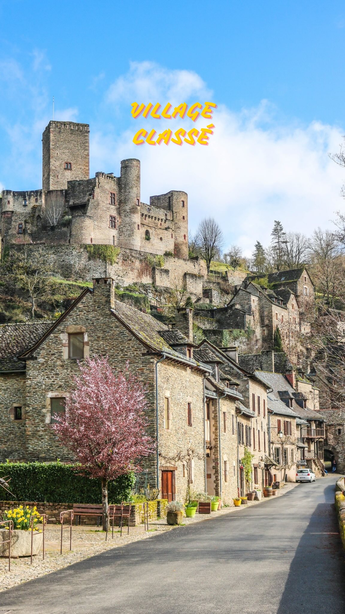 Medieval Village Featuring Castle and Historic Church