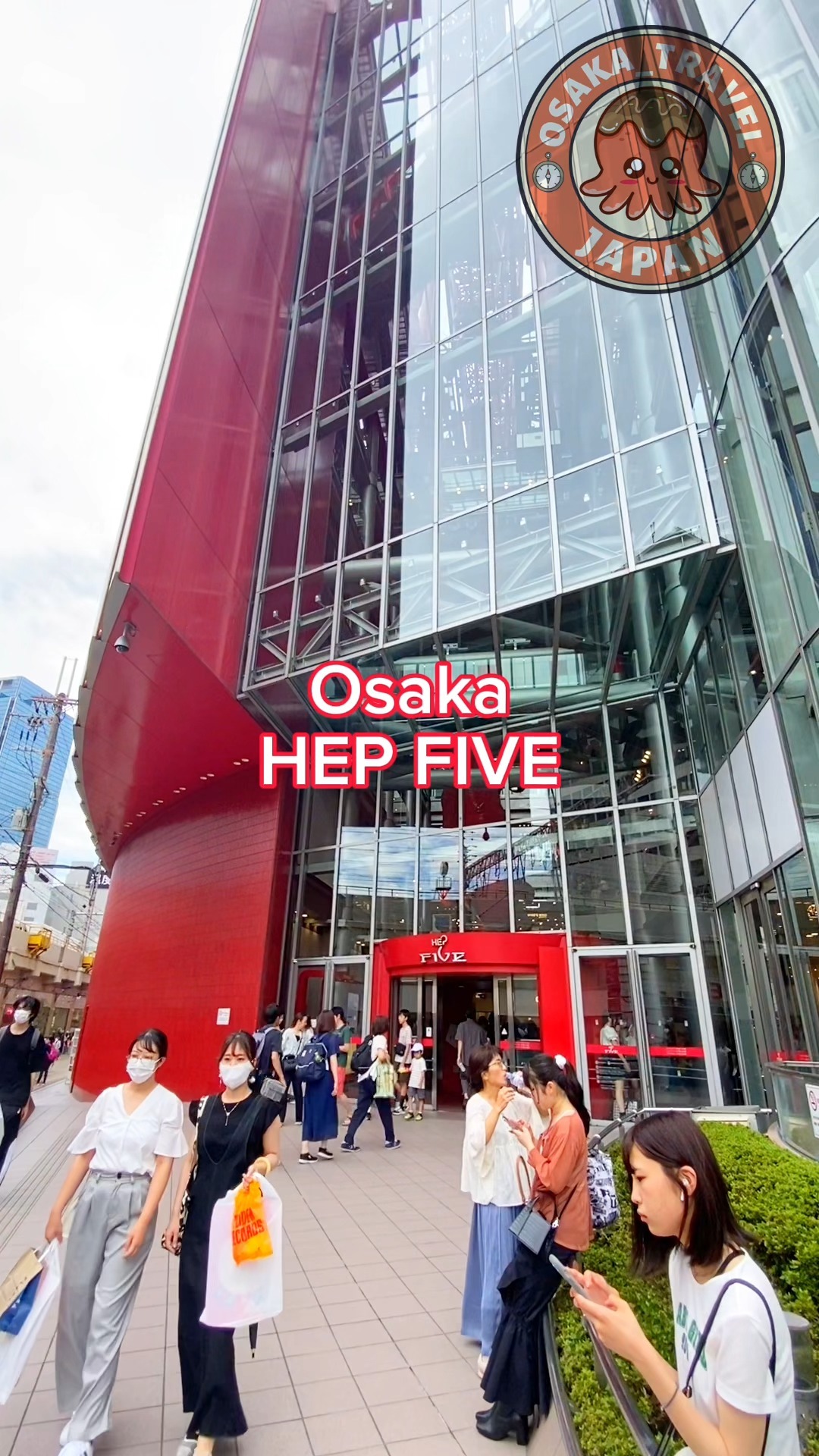 Osaka's Iconic Ferris Wheel And Shopping Destinations