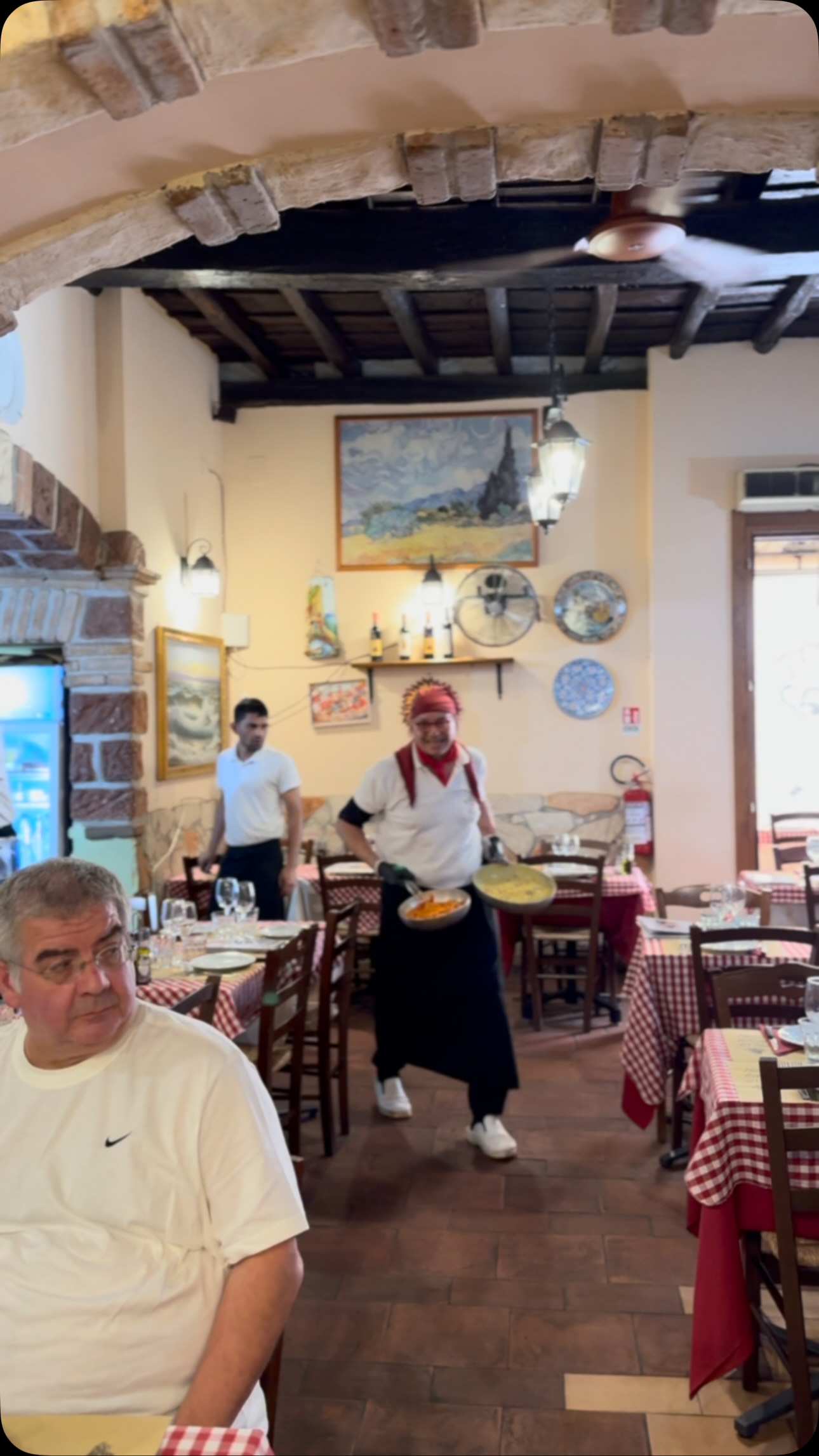 Chef Serves Pasta Tableside at Lively Italian Eatery
