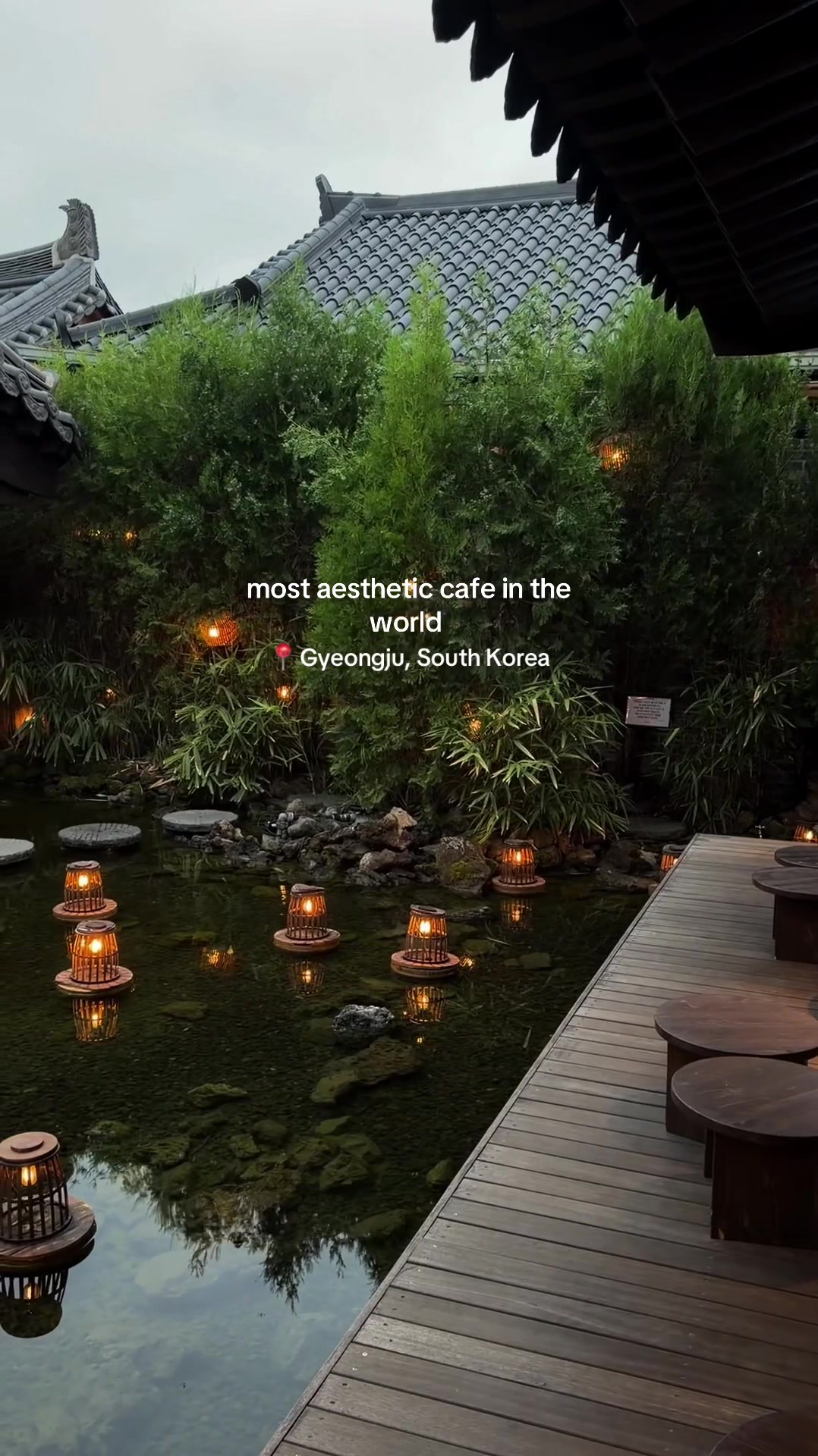 Traditional Korean Cafe With Pond And Lanterns