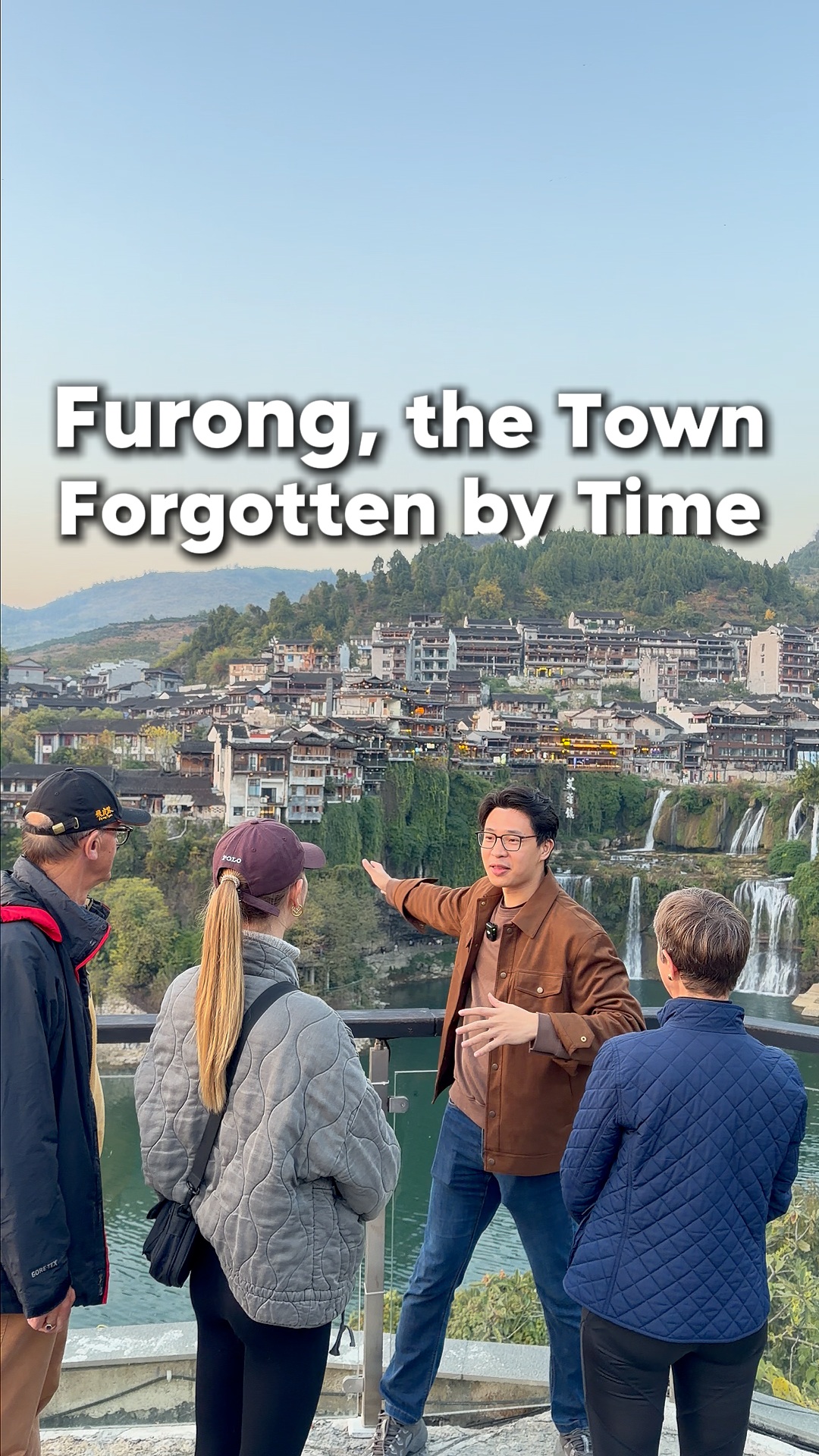 Waterfalls And Wooden Homes In Historic Chinese Towns