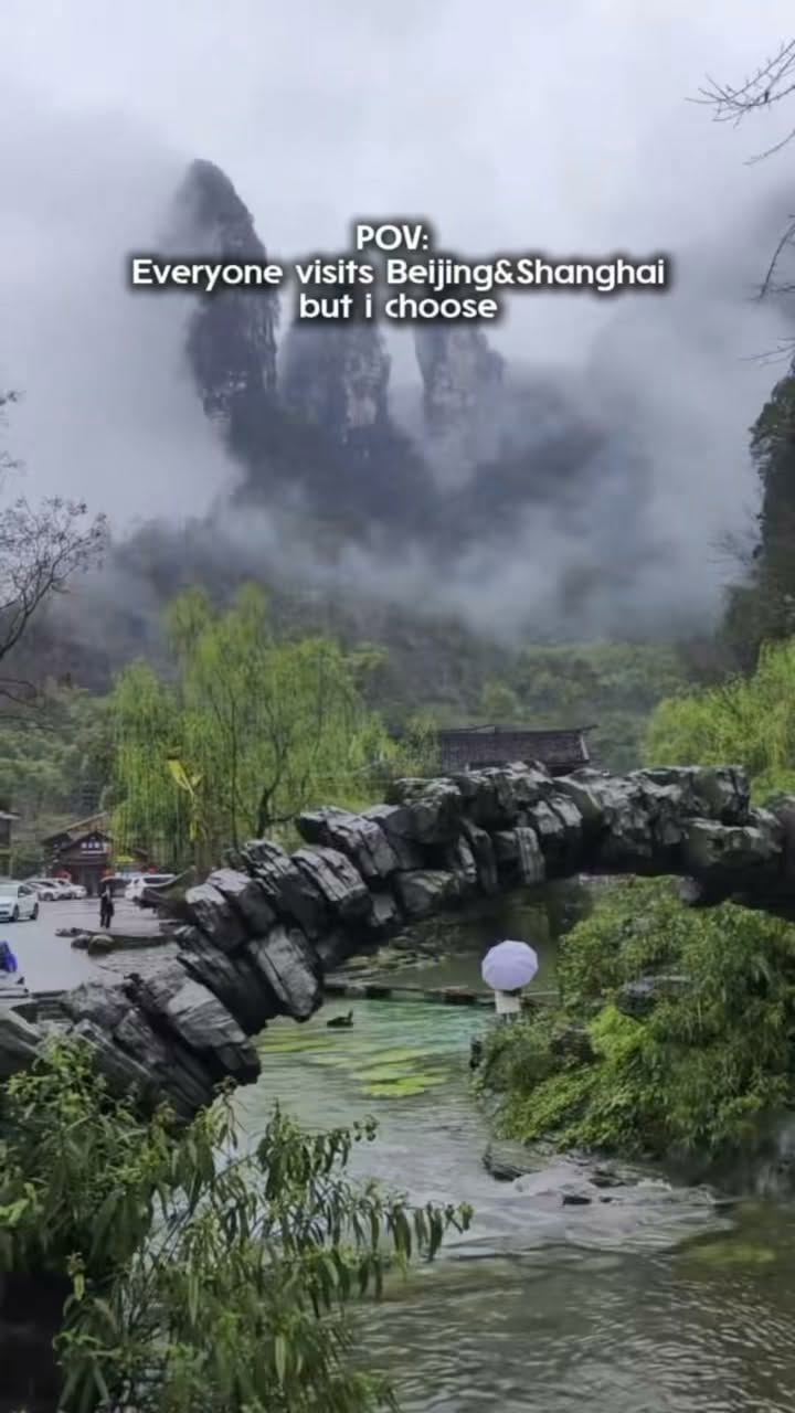 Xiangxi: Ancient Towns, Waterfalls, and Bridges