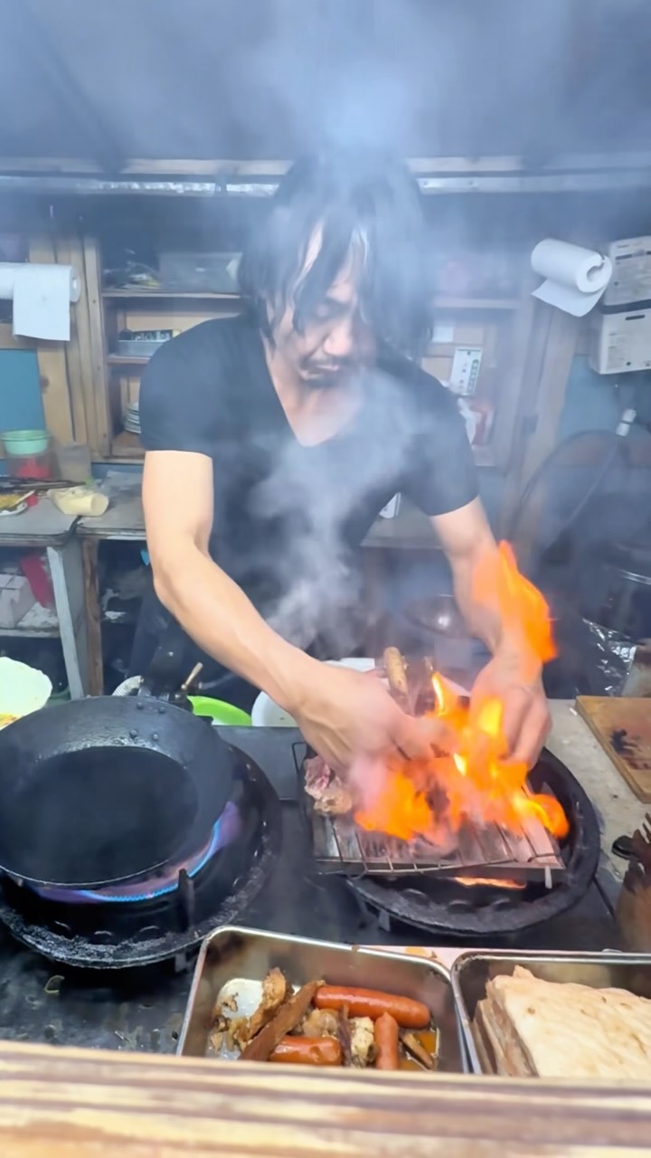 Japanese Street Food Vendor Showcases Culinary Skills