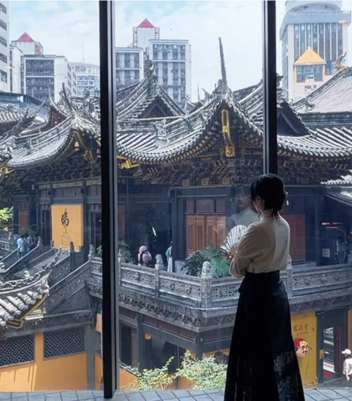 Temple and Skyscraper Views at Dede Coffee