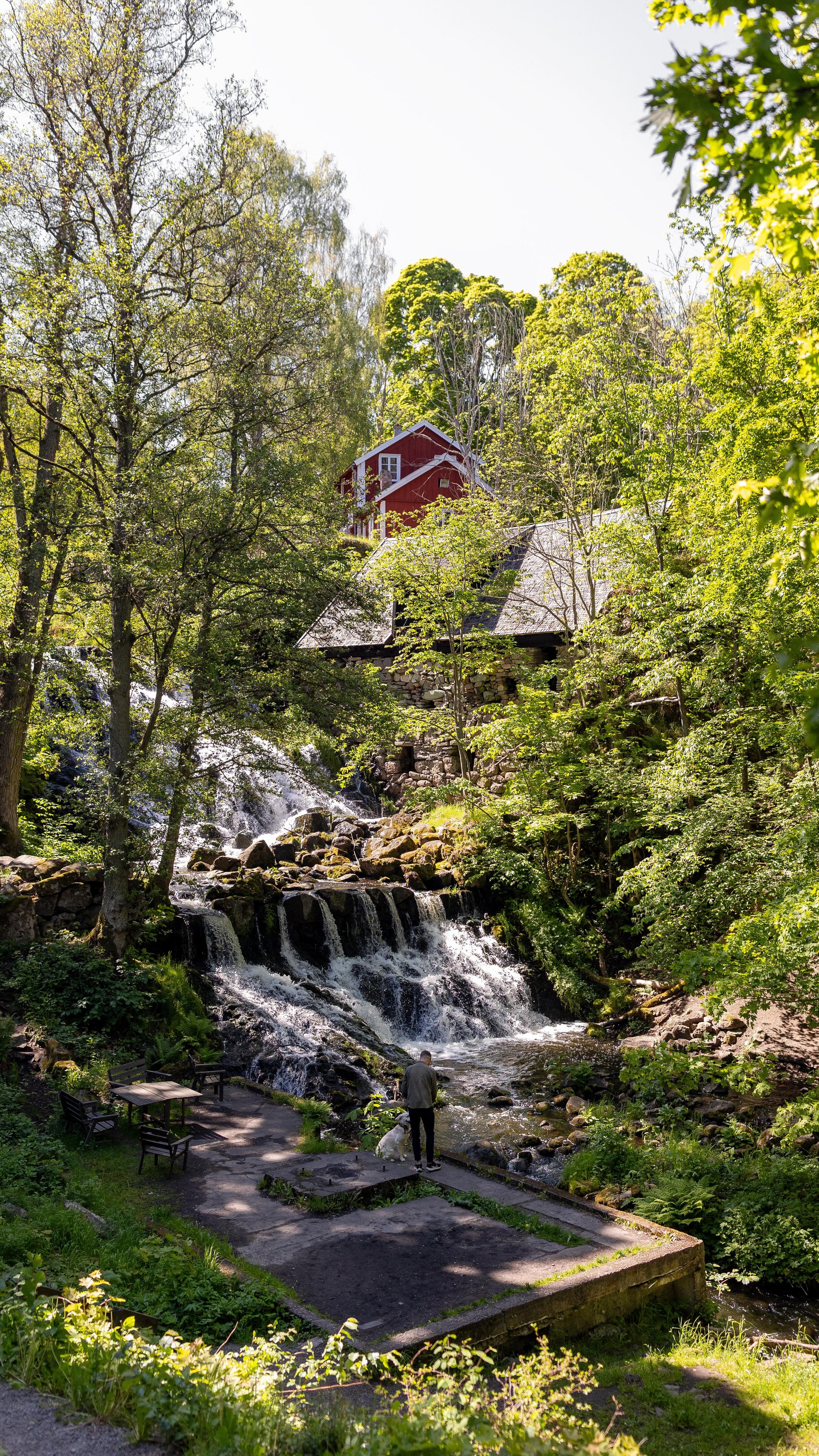 Charming Lakeside Village With Waterfall