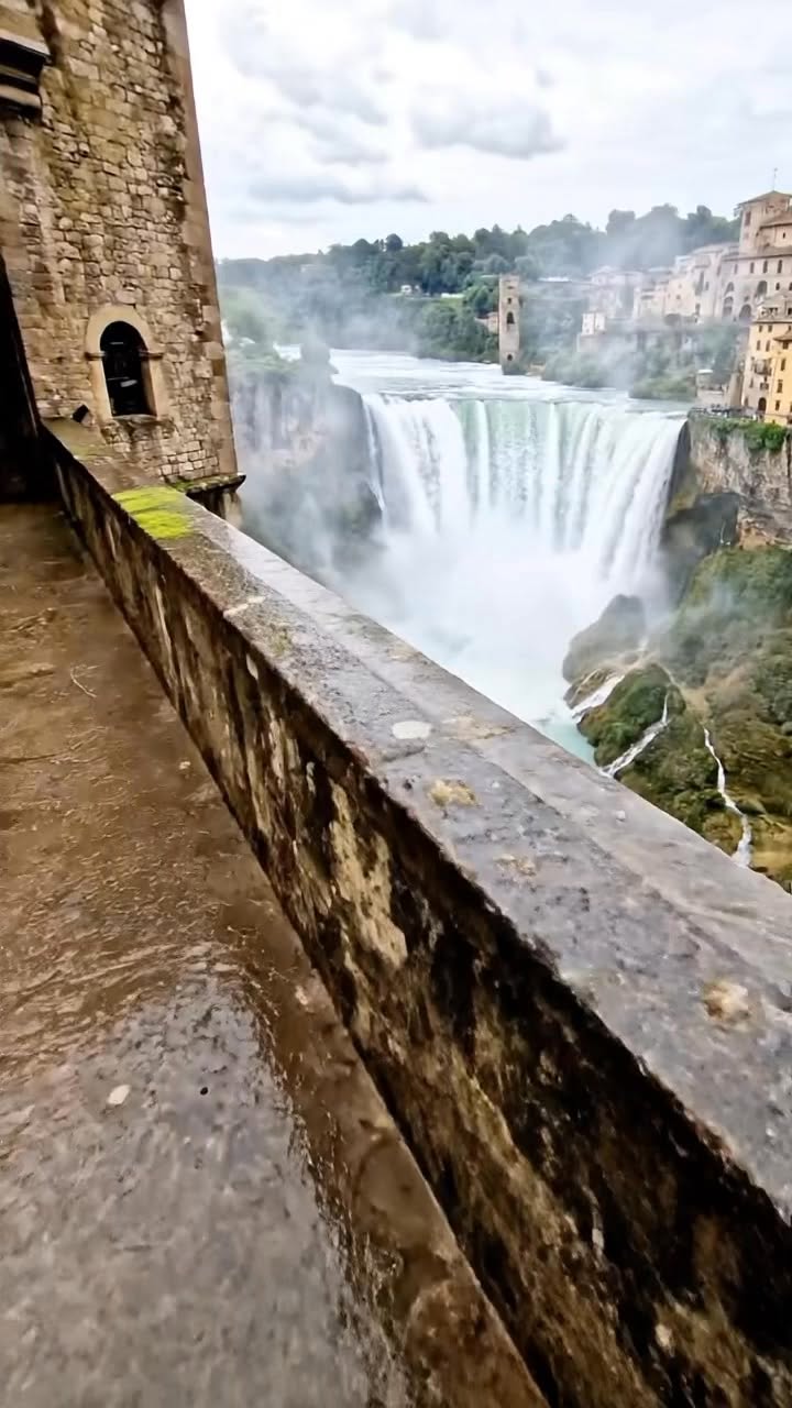 Castle and Urban Waterfall in Italy