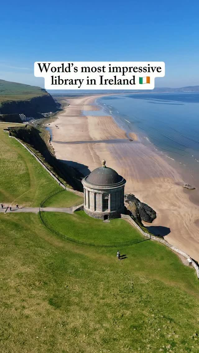 Coastal Cliffs And Historic Temple Overlooking Beach