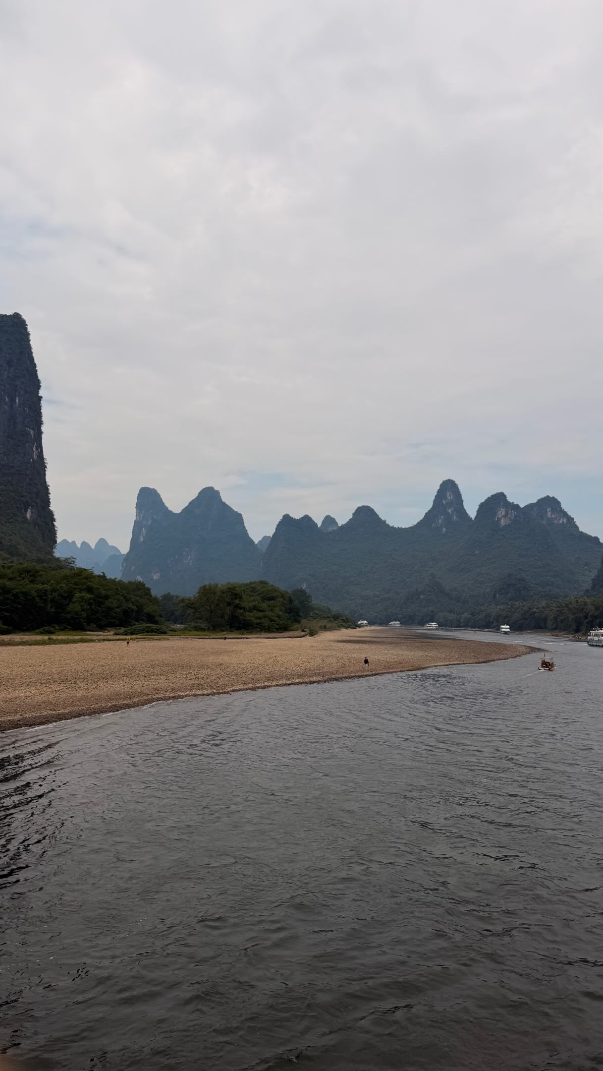 Karst River Cruise Through Guilin's Mountains