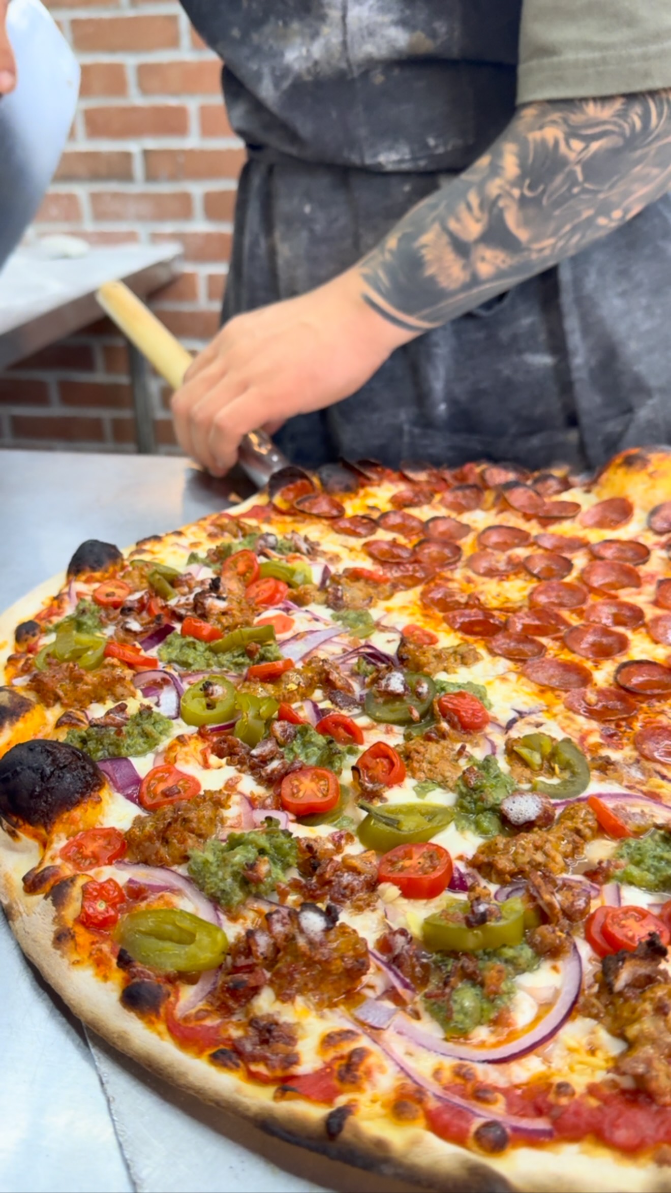 Brick Oven Pizza Cut At Long Beach Convention Center