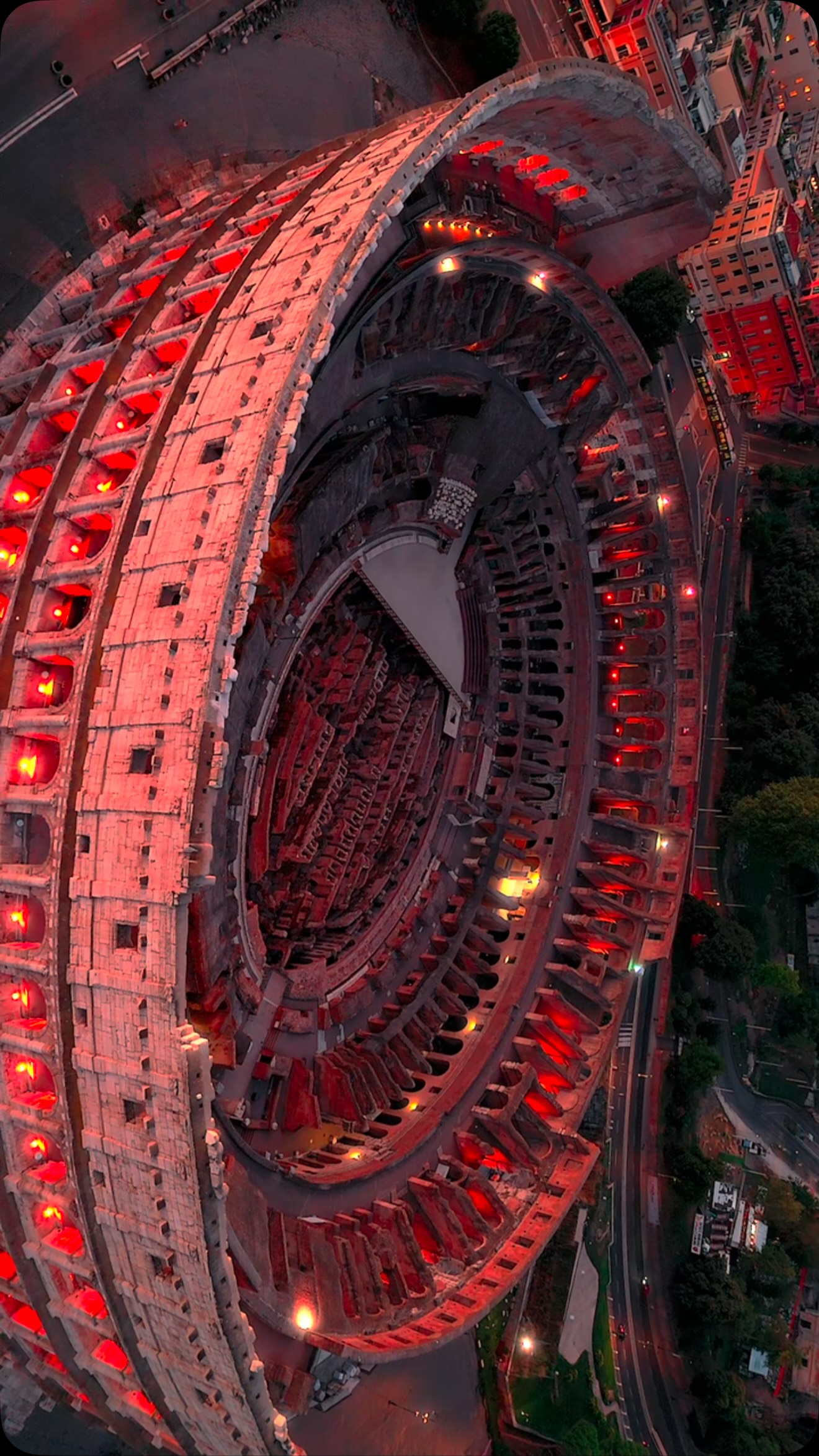 Colosseum's Red Glow in Rome