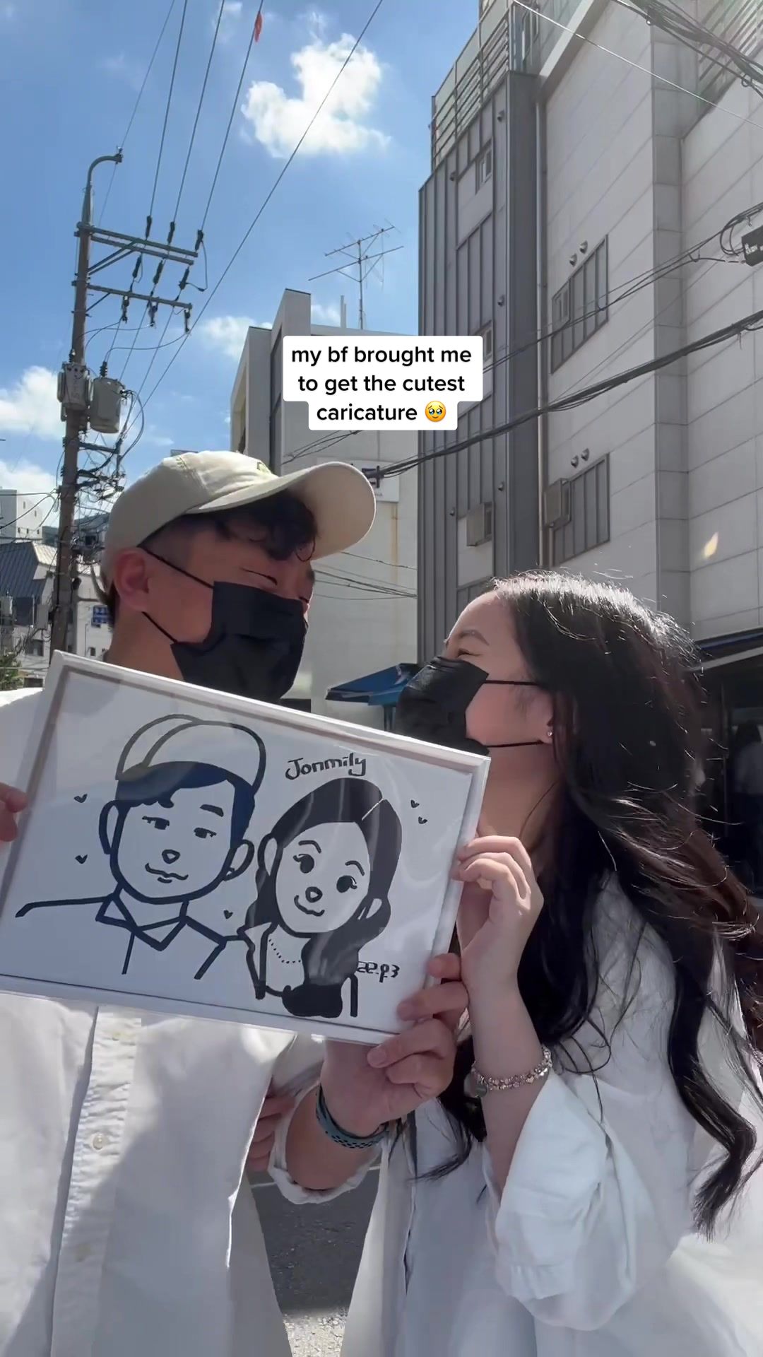 Couple Enjoys Caricature Art in Korea