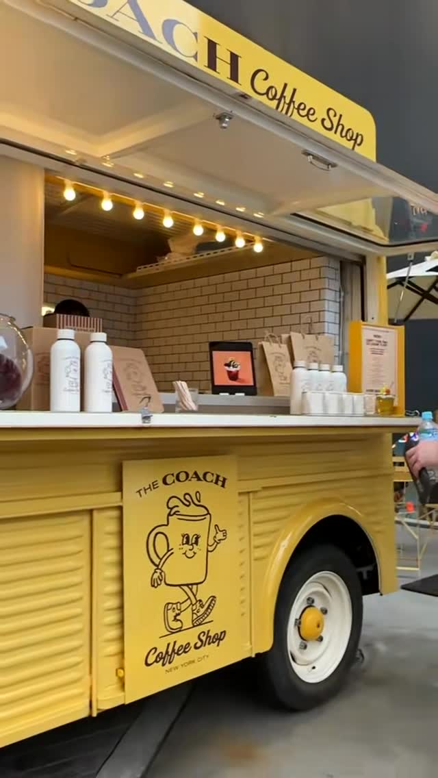 Coach Shops Offer Handbags, Cafe Treats