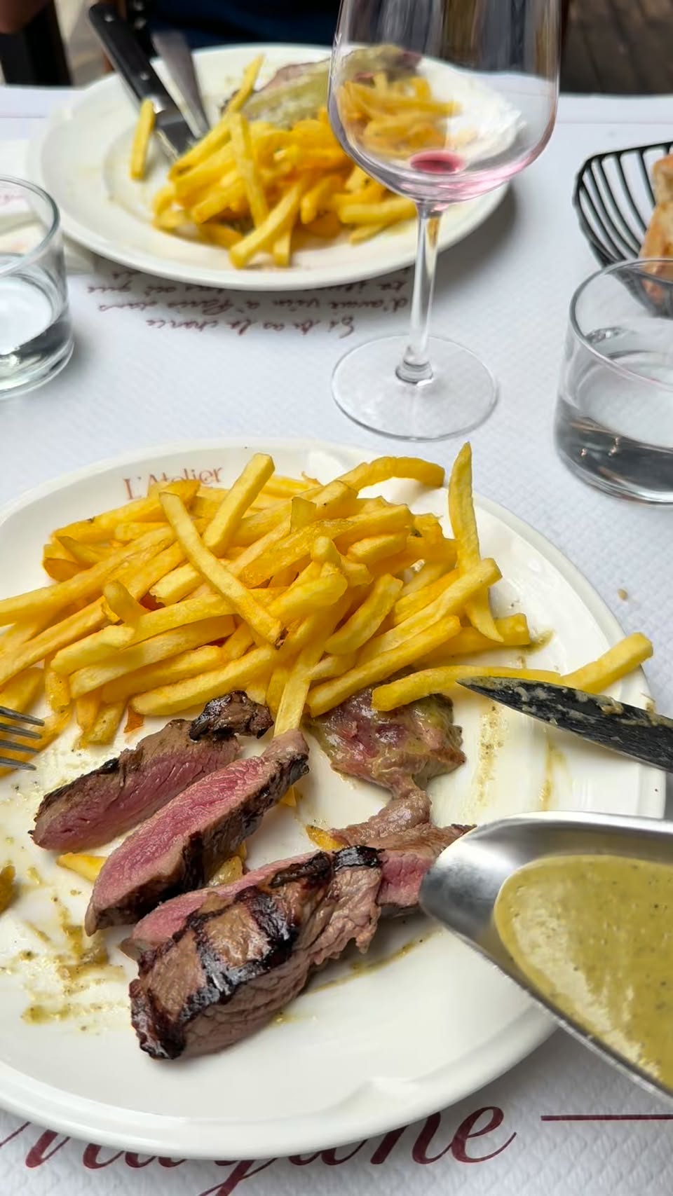 Paris Steak Frites Restaurant With Green Sauce