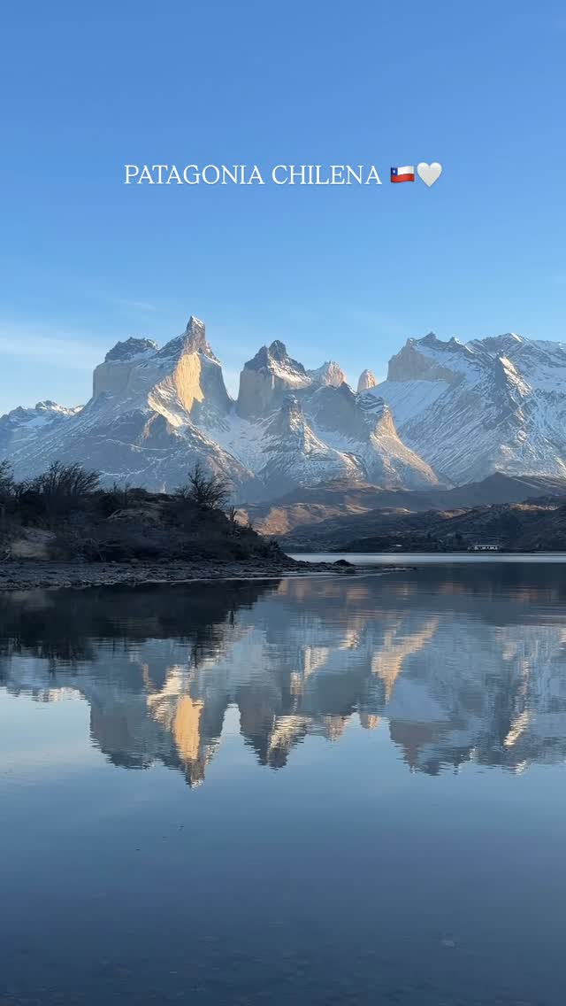 Patagonia's Majestic Mountains And Reflective Lake