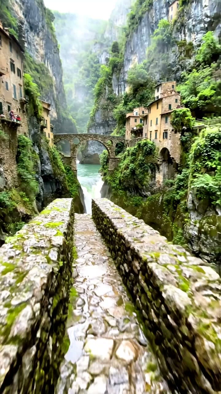 Lombardy Waterfall Plunges Into Lake Como