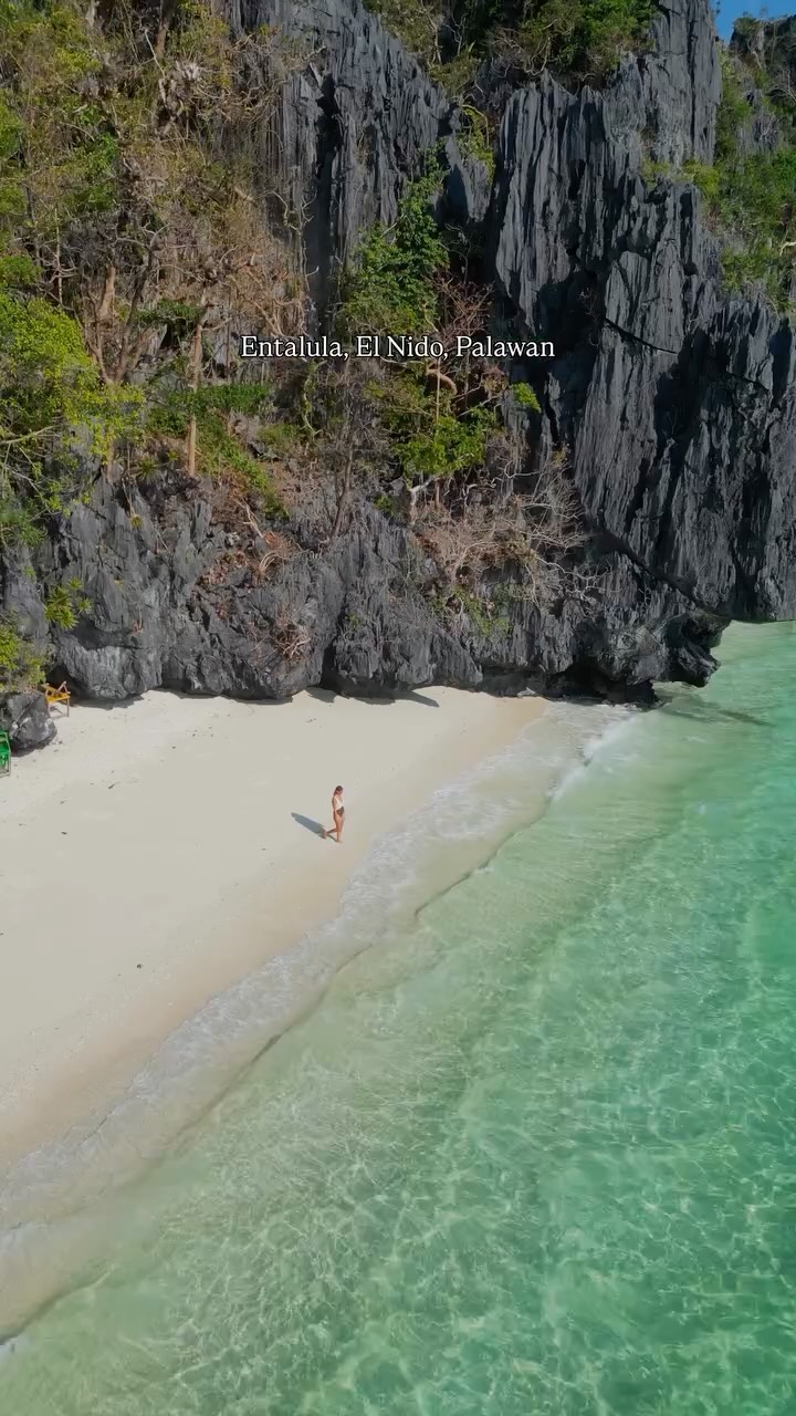 Entalula Beach's Turquoise Waters and Rock Formations