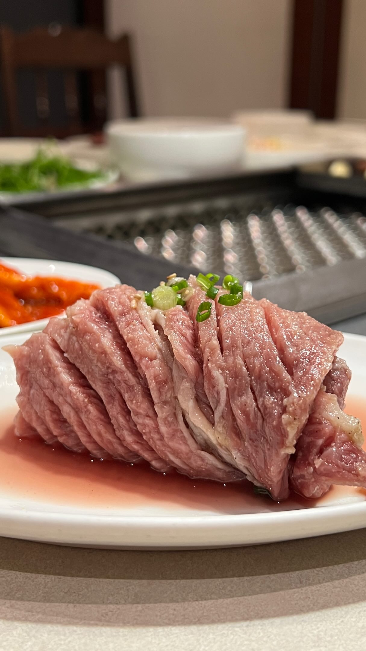 Korean Barbecue Restaurant with Beef and Banchan