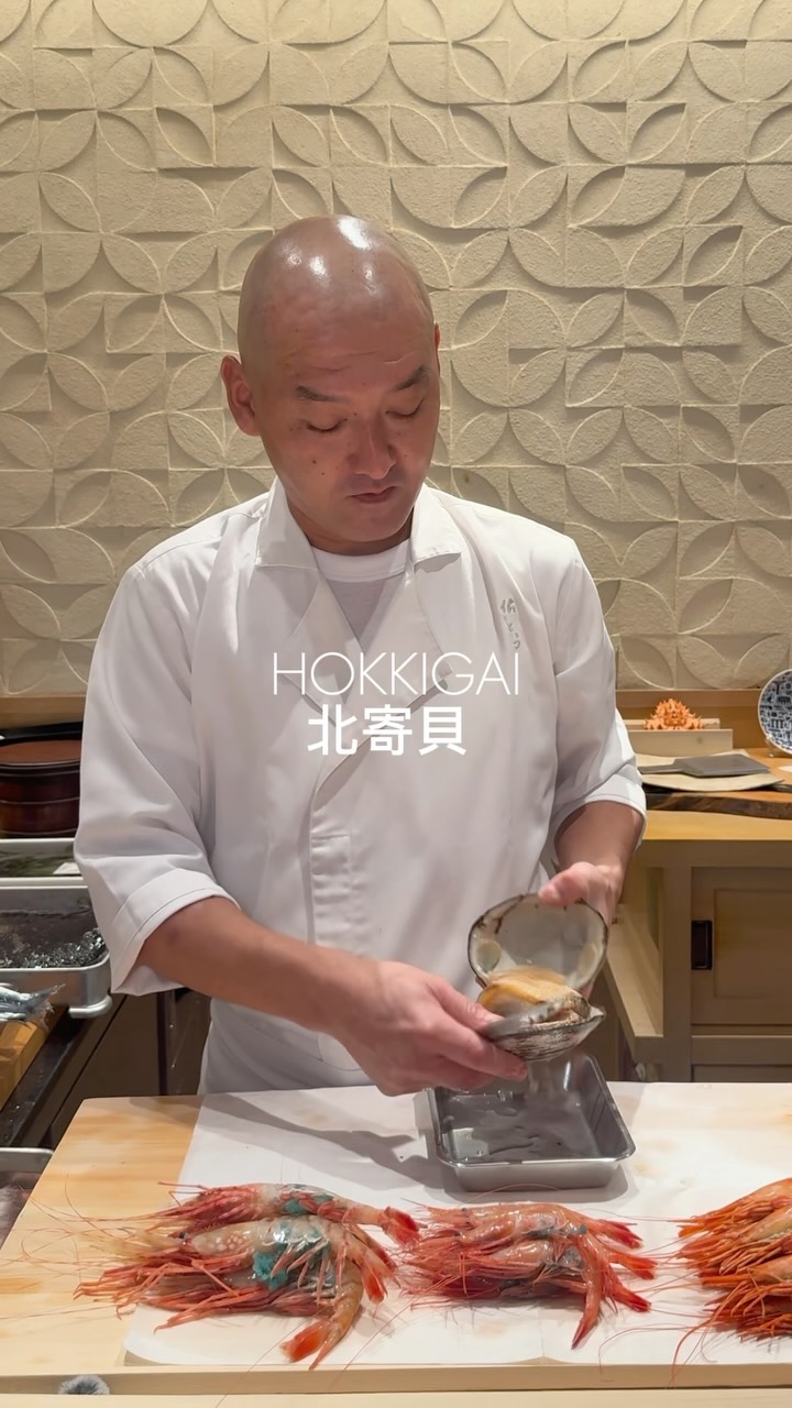 Chef Prepares Fresh Surf Clam at Counter