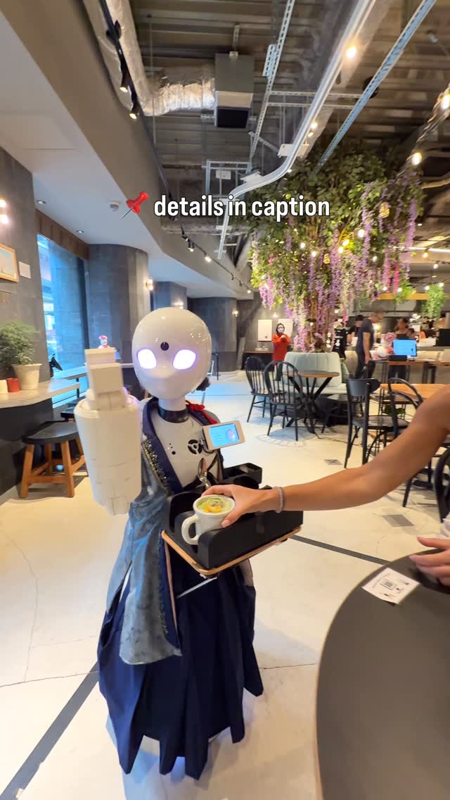 Robots Serve Customers At Tokyo's DAWN Cafe