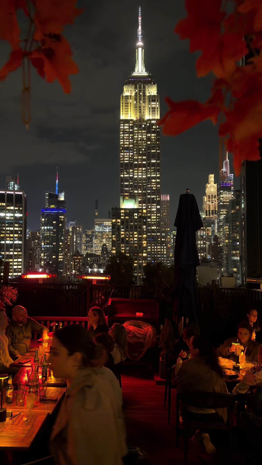 NYC Rooftop Bar Offers Skyline Views and Pumpkin Arch