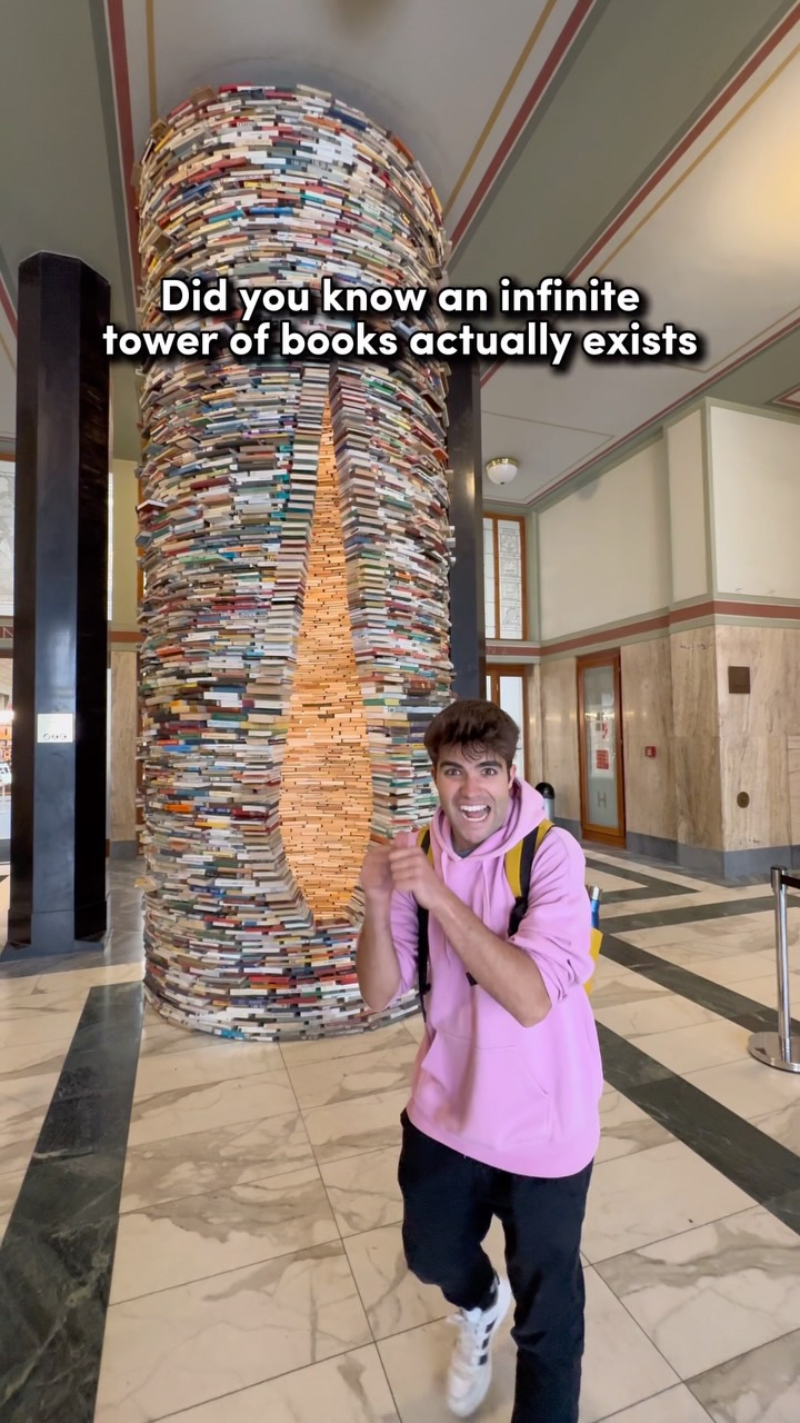 Prague Library's Infinite Book Tower Installation