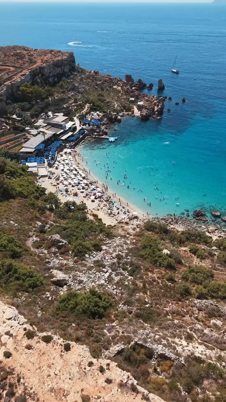 Paradise Bay's Scenic Waters And Sandy Beach