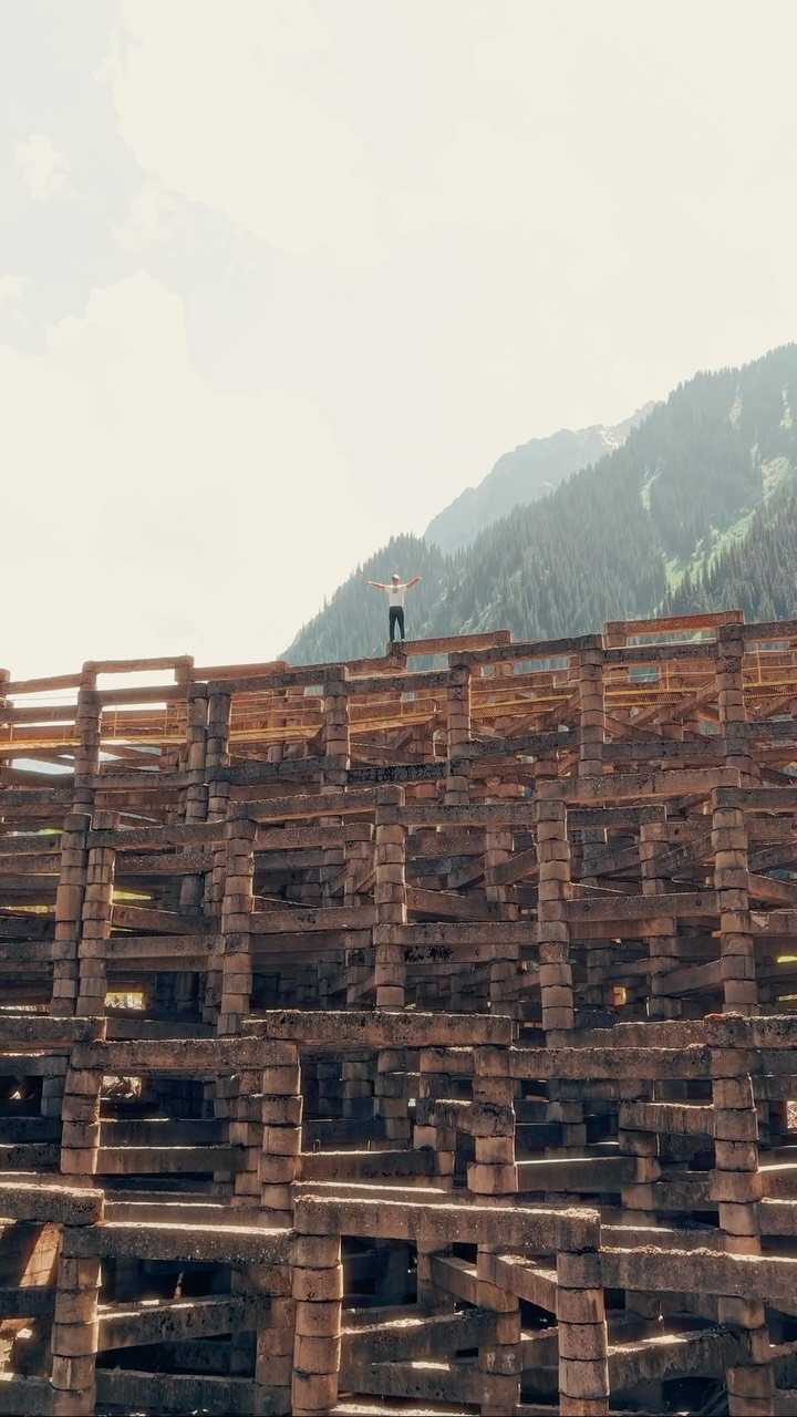 Man Standing on Unusual Structure in Kazakhstan