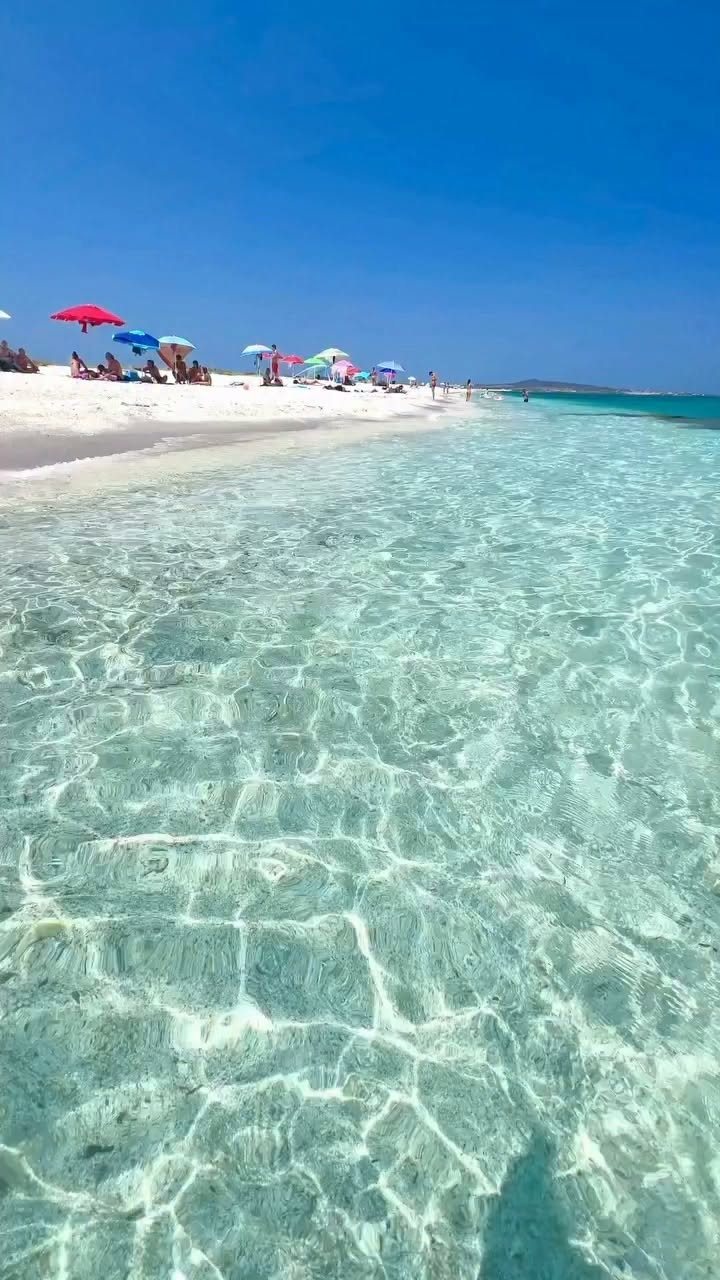 Sardinia's Ezzi Mannu Beach: Turquoise Waters, White Sand
